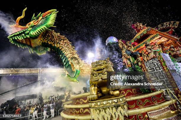 Members of Unidos de Vila Maria Samba School perform on top of a float during the parade at Anhembi Sambadrome of Sao Paulo on February 22, 2020 in...