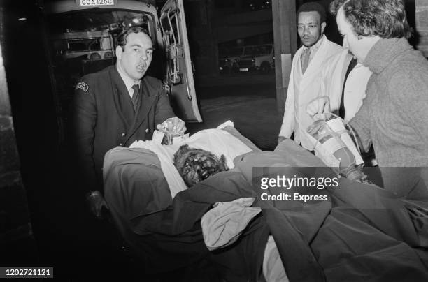 Victim arriving at hospital after they were injured in the Birmingham pub bombings which took place on 21st November 1974, in Birmingham, West...
