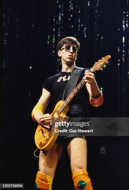 American singer, songwriter, composer and musician Bob Mothersbaugh of rock band Devo performing live, circa 1979.