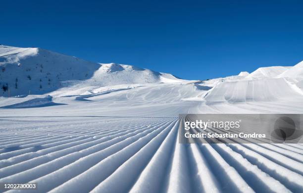 turracher hohe ski run track in snow, winter season background in carinthia austria. - pista de esquí fotografías e imágenes de stock