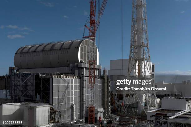 Unit 3 and Unit 4 reactor buildings stand at Tokyo Electric Power Co.'s Fukushima Dai-ichi nuclear power plant on January 29, 2020 in Okuma,...