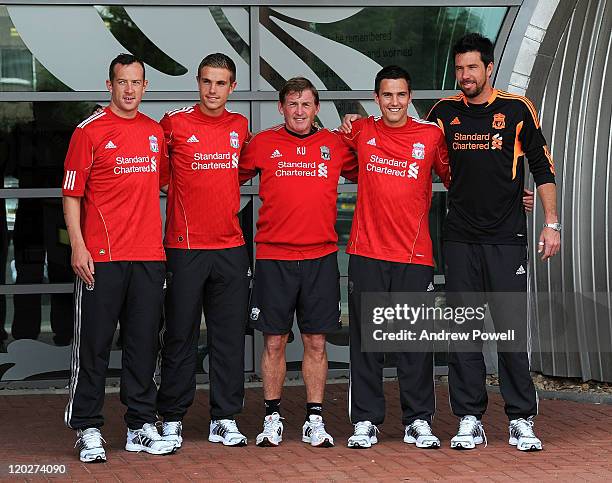 Manager Kenny Dalglish presents new signings Charlie Adam, Jordan Henderson, Stewart Downing and Alexander Doni of Liverpool following a press...