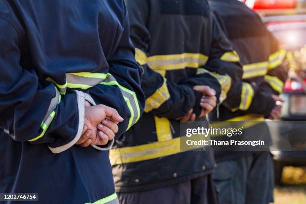 save to board"ndiverse group of fire fighters at the station - fire station ストックフォトと画像