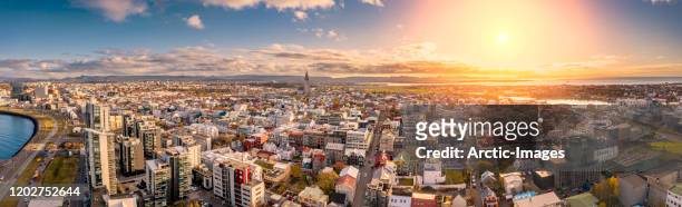 panorama - reykjavik skyline at sunset, iceland - hallgrimskirkja stock pictures, royalty-free photos & images