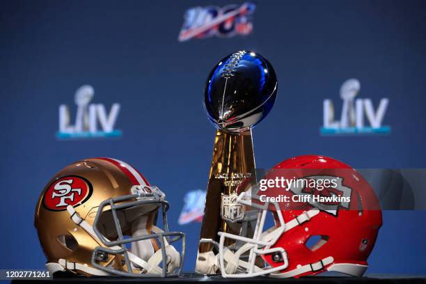 The Vince Lombardi Trophy is displayed with helmets of the San Francisco 49ers and Kansas City Chiefs prior to a press conference with NFL...