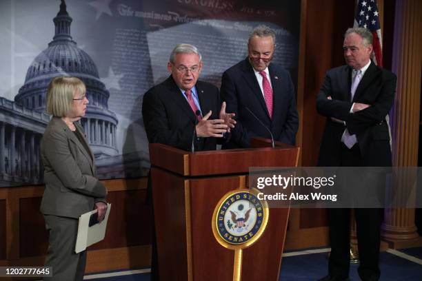 Sen. Robert Menendez speaks as Sen. Patty Murray , Senate Minority Leader Sen. Chuck Schumer and Sen. Tim Kaine listen during a news conference prior...