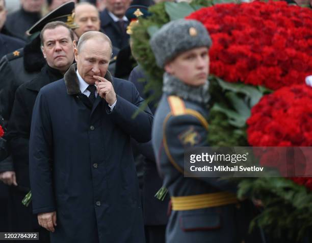 Russian President Vladimir Putin and Security Council Deputy Chairman Dmitry Medvedev seen during the wreath laying ceremony to the Tomb of Unknown...