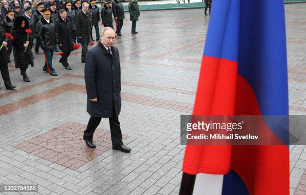 Russian President Vladimir Putin attends the wreath laying ceremony to the Tomb of Unknown Soldier in front of the Kremlin on February 23, 2020 in...