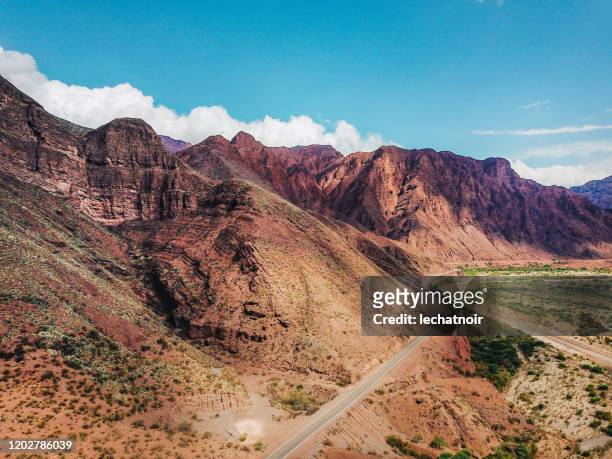 aerial view on the red rocky mountains of argentina - salta argentina stock pictures, royalty-free photos & images