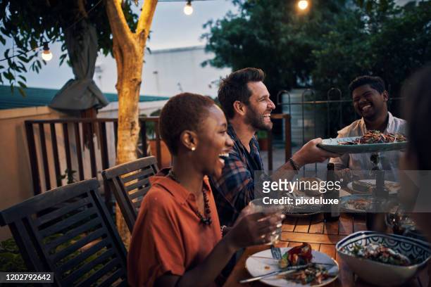 the best company for a backyard dinner party - backyard barbeque stock pictures, royalty-free photos & images
