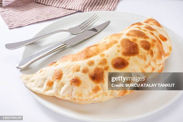 calzone with ham - calzone stock-fotos und bilder