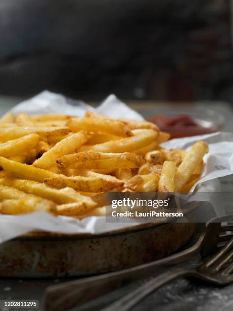 platter of hand cut cut fries - french fries stock pictures, royalty-free photos & images