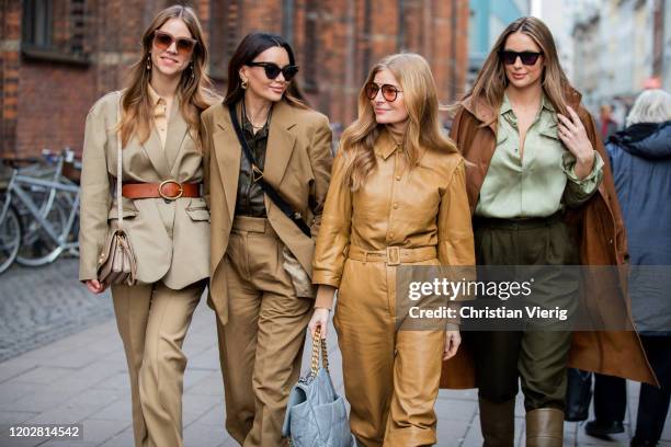 Trine Kjaer wearing beige belted blazer and pants, Funda Christophersen wearing brown suit, Bottega Veneta bag, Mie Jul wearing beige overall and...