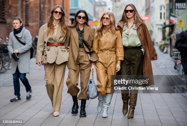 Trine Kjaer wearing beige belted blazer and pants, Funda Christophersen wearing brown suit, Bottega Veneta bag, Mie Jul wearing beige overall and...