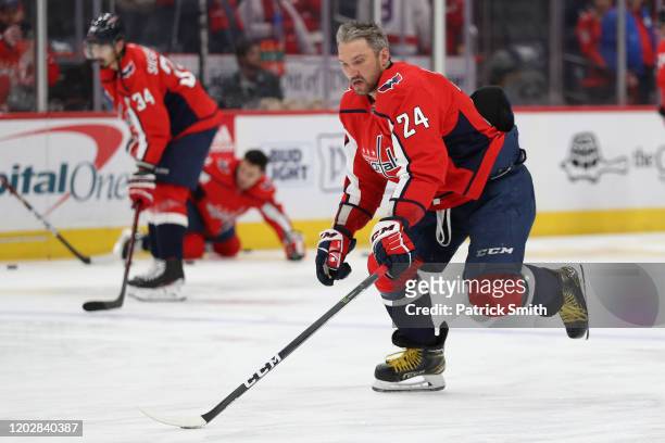Alex Ovechkin of the Washington Capitals wears Kobe Bryant’s number 24 on his jersey as he warm ups before playing against the Nashville Predators at...