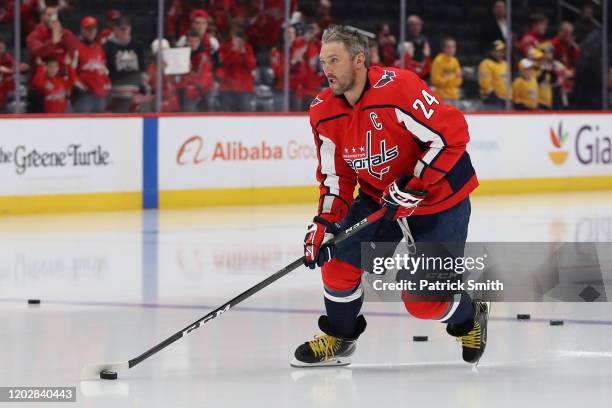 Alex Ovechkin of the Washington Capitals wears Kobe Bryant’s number 24 on his jersey as he warm ups before playing against the Nashville Predators at...