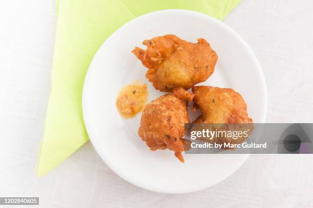 accras, or cod fritters, le francois, martinique - cod stock pictures, royalty-free photos & images