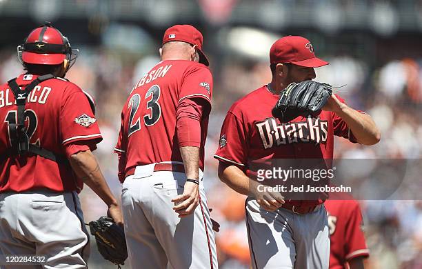 Jason Marquis of the Arizona Diamondbacks is taken out of the game in the fifth inning by manager Kirk Gibson against the San Francisco Giants at...