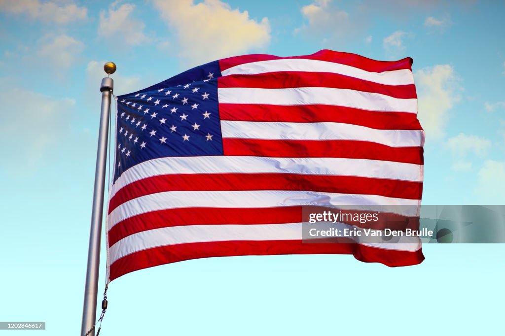 United States Flag against blue sky