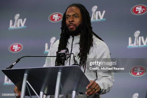 Richard Sherman of the San Francisco 49ers speaks to the media during the San Francisco 49ers media availability prior to Super Bowl LIV at the James...