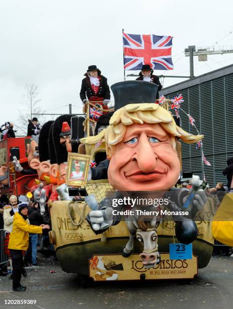 Chariot bearing the image of the British Prime Minister Boris Johnson parades during the 92nd edition of the Aalst Carnival parade on February 23,...