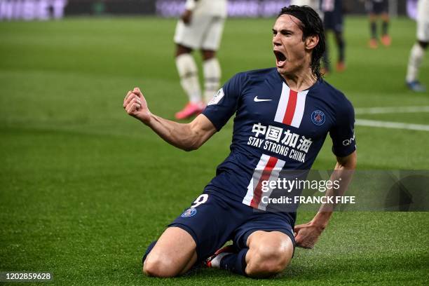 Paris Saint-Germain's Uruguayan forward Edinson Cavani celebrates after scoring a goal during the French L1 football match between Paris...