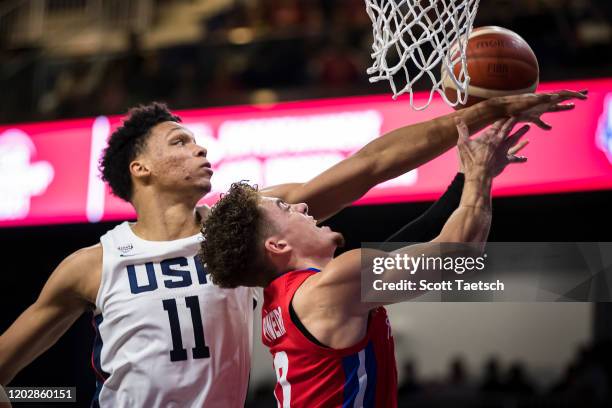 Ivan Rabb of United States defends a shot by Isaiah Pineiro of Puerto Rico during the first half of the FIBA AmeriCup Qualifying game at...