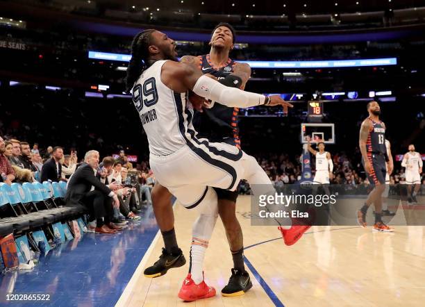 Elfrid Payton of the New York Knicks shoves Jae Crowder of the Memphis Grizzlies after he attempted a three point shot in the final minutes of the...
