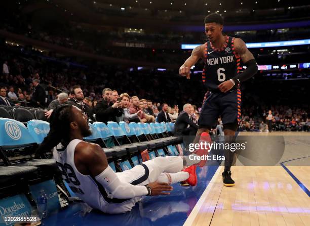 Elfrid Payton of the New York Knicks shoves Jae Crowder of the Memphis Grizzlies after he attempted a three point shot in the final minutes of the...