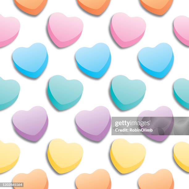 large candy hearts seamless pattern - candy heart stock illustrations