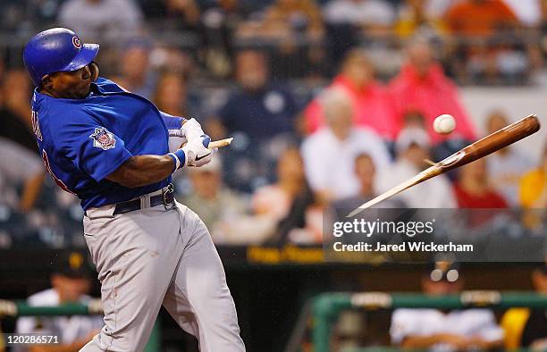 Marlon Byrd of the Chicago Cubs breaks his bat on the final out of the fourth inning against the Pittsburgh Pirates during the game on August 3, 2011...