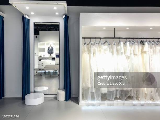 cloakroom - white wedding dress stock pictures, royalty-free photos & images