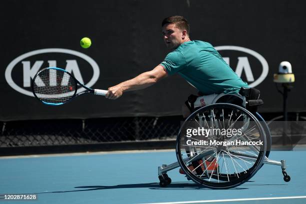 Gordon Reid of Great Britain plays a backhand in his Men's Wheelchair Singles Semifinal match against Joachim Gerard of Belgiumon day eleven of the...