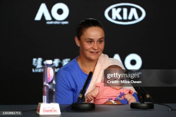 Ashleigh Barty of Australia holds her niece Olivia during a press conference after defeat in her Women's Singles Semifinals match against Sofia Kenin...