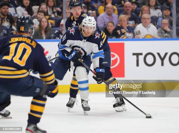 Kyle Connor of the Winnipeg Jets looks to take a shot on goal during the third period against the Buffalo Sabres at KeyBank Center on February 23,...