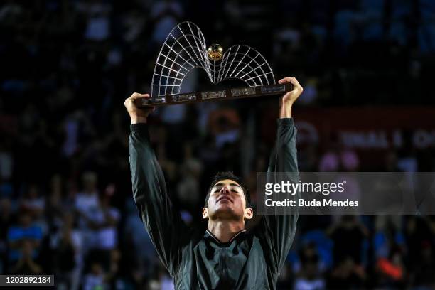Cristian Garin of Chile celebrates with the trophy after defeating Gianluca Mager of Italy at the men's singles final match of the ATP Rio Open 2020...