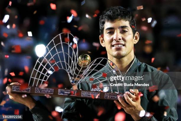 Cristian Garin of Chile celebrates with the trophy after defeating Gianluca Mager of Italy at the men's singles final match of the ATP Rio Open 2020...