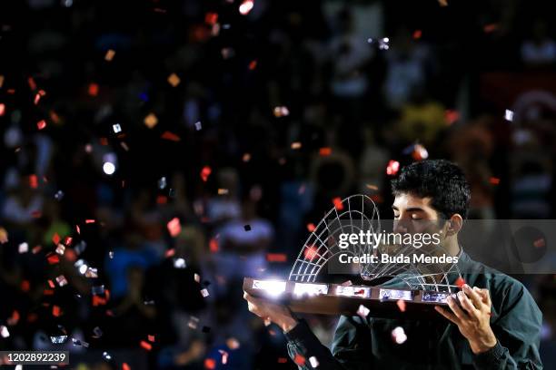 Cristian Garin of Chile celebrates with the trophy after defeating Gianluca Mager of Italy at the men's singles final match of the ATP Rio Open 2020...