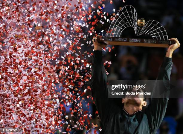 Cristian Garin of Chile celebrates with the trophy after defeating Gianluca Mager of Italy at the men's singles final match of the ATP Rio Open 2020...