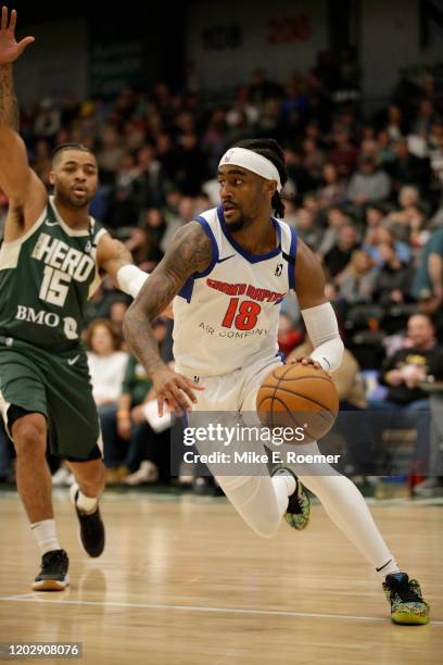 February 23: Grand Rapids Drive guard Jordan Bone drives to the basket as Wisconsin Herd guard Frank Mason defends in a NBA G-League game on Sunday...