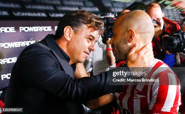 Marcelo Gallardo , coach of River Plate, greets Javier Mascherano of Estudiantes before a match between Estudiantes and River Plate as part of...