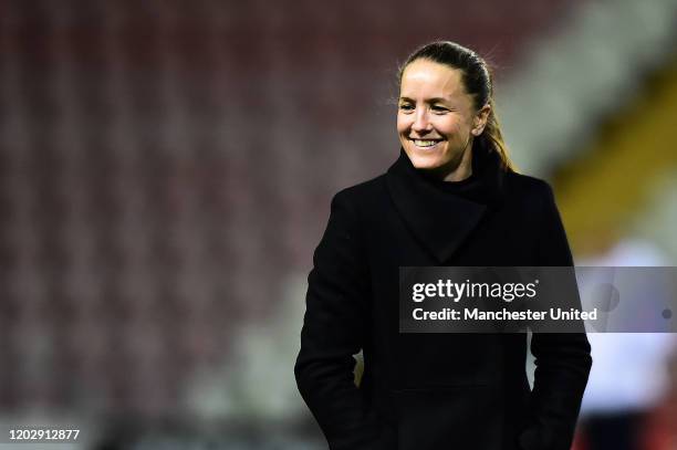 Manager Casey Stoney of Manchester United Women watches the warm up ahead of the FA Women's Continental League Cup Semi-Final match between...
