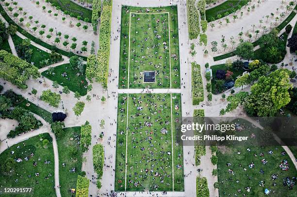 people in champs de mars park - aerial crowd stock-fotos und bilder