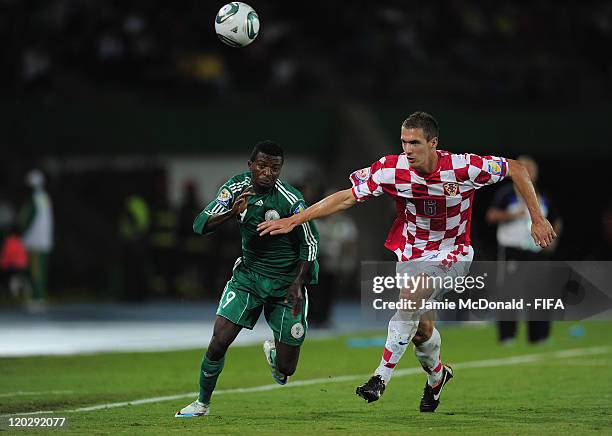 Olarenwaju Kayode of Nigeria battles with Tomislav Glumac of Croatia during the FIFA U-20 World Cup Group D match between Croatia and Nigeria at the...