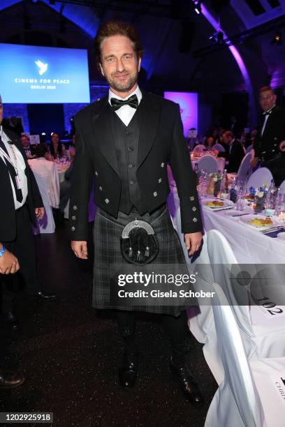 Gerard Butler wearing a kilt during the Cinema For Peace Gala at Westhafen Event & Convention Center on February 23, 2019 in Berlin, Germany.