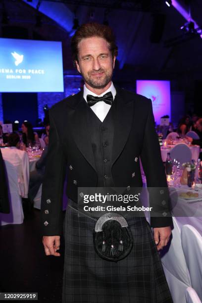 Gerard Butler wearing a kilt during the Cinema For Peace Gala at Westhafen Event & Convention Center on February 23, 2019 in Berlin, Germany.