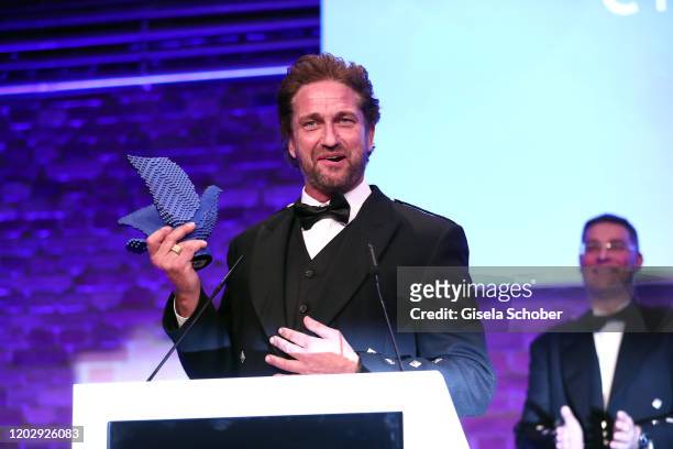 Gerard Butler during the Cinema For Peace Gala at Westhafen Event & Convention Center on February 23, 2019 in Berlin, Germany.
