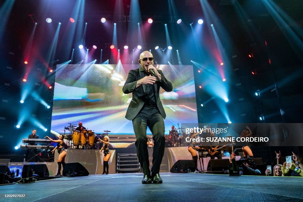 Pitbull Rapper Performance US rapper Pitbull performs in concert at the H-E-B Center on February ...