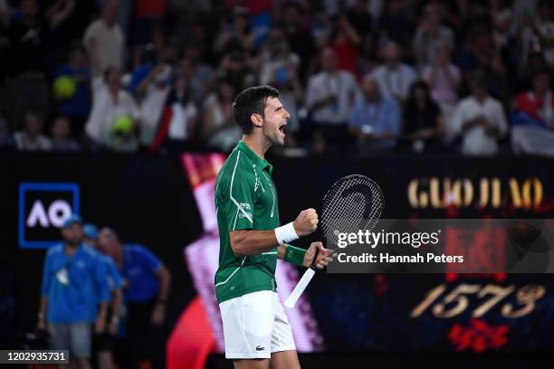 Novak Djokovic of Serbia celebrates after winning his Men's Singles Semifinal match against Roger Federer of Switzerland on day eleven of the 2020...