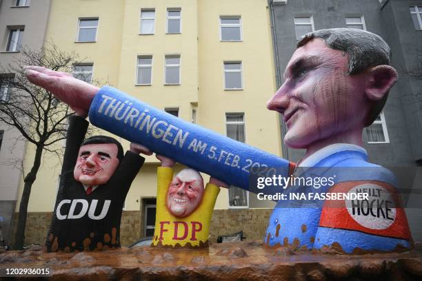 Carnival float depicts Bjoern Hoecke , regional leader in Thuringia of Germany's far-right Alternative for Germany party, supported by Mike Mohring...